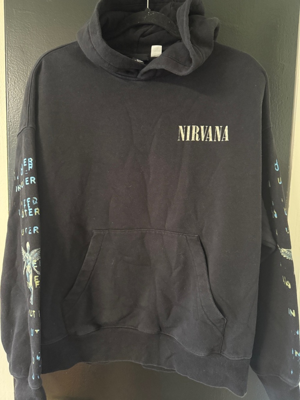 H&M loose-fit Nirvana hoodie, featuring a cotton-blend fabric, lined hood
